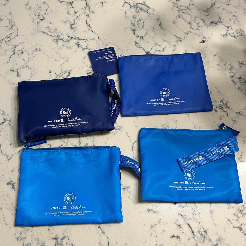 Lot of 4 United Airlines Christie Shinn Hawaii 1st Class Amenity Bags  1 is New - Picture 2 of 2